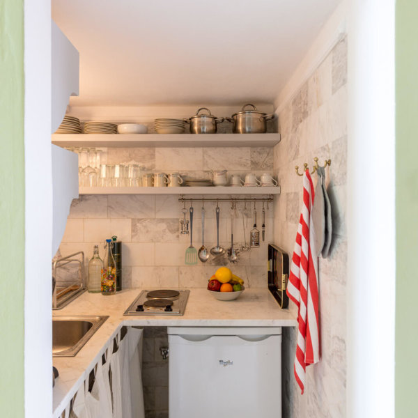 Communal kitchenette with two other rooms